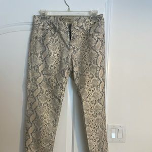 Snake skin styled 5 pocket jeans.